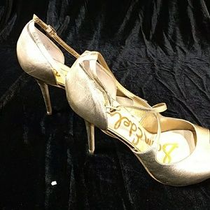 Sam Edelman gold stillettos.